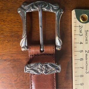 Women’s fossil belt size large with western silver buckle and details